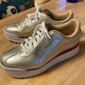 Brand new Gold Puma platform sneakers
